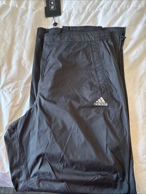 adidas Black Men's Lightweight ClimaProof Rain pants.